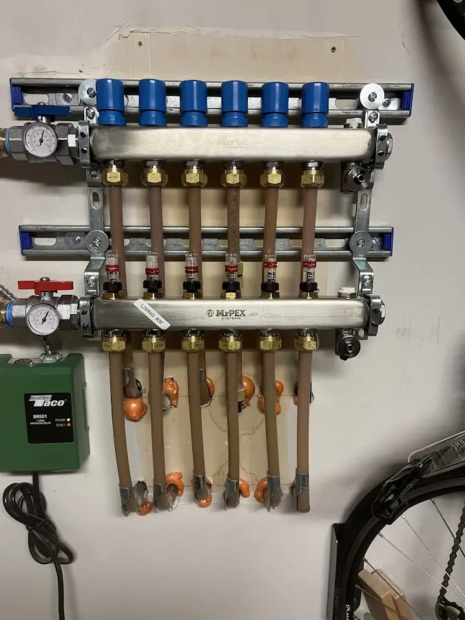 Plumber performing Water Heater Repair at a residential property in Parowan